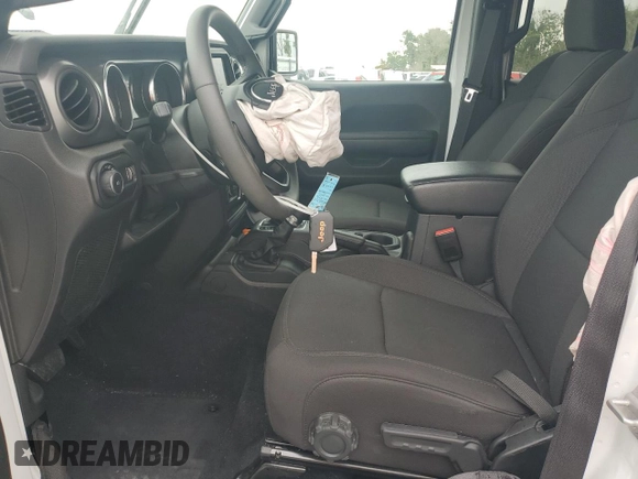 2023 Jeep Wrangler Willys with VIN 1C4HJXDN8PW625204, listed as a Copart auction lot 59328065 with 18,116 mi miles and Salvage title. Bid and sale history available at DreamBid. Image 7.