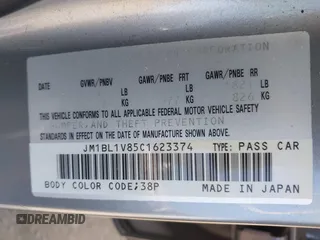 2012 Mazda 3 i Touring with VIN JM1BL1V85C1623374, listed as a IAAI auction lot 42106820 with 117,262 mi miles and . Bid and sale history available at carsss.com. Image 9.