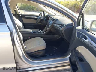 2018 Ford Fusion Hybrid S with VIN 3FA6P0UU8JR244912, listed as a IAAI auction lot 41742940 with 65,885 mi miles. Bid and sale history available at carsss.com. Image 5.