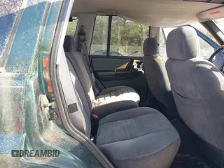 1996 Jeep Grand Cherokee with VIN 1J4EZ58Y7TC128428, listed as a IAAI auction lot 42050443 with 241,591 mi miles and . Bid and sale history available at DreamBid. Image 8.