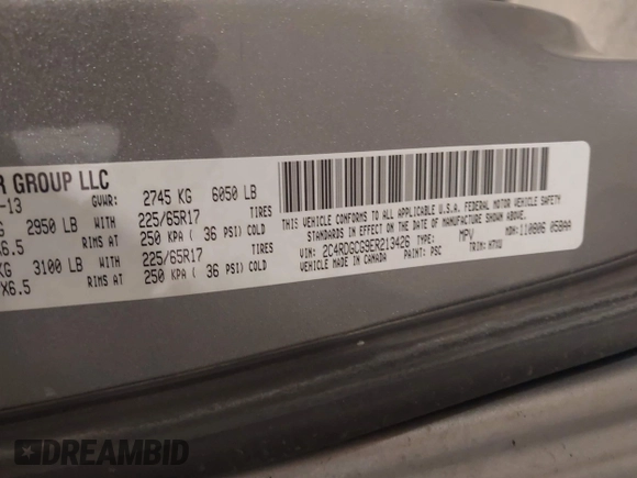 2014 Dodge Grand Caravan SXT with VIN 2C4RDGCG9ER213426, listed as a IAAI auction lot 41044553 with 175,140 mi miles and . Bid and sale history available at DreamBid. Image 9.