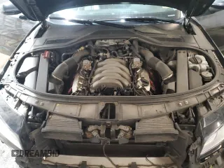 2011 Audi A8 z VIN WAURVAFD7BN006275, wystawiony jako Copart lot #58306205 z przebiegiem 190 383 mil mil oraz Szkody całkowita. Historia ofert i sprzedaży dostępna na DreamBid. Obrazek 11.