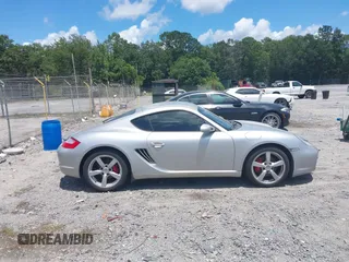 2006 Porsche Cayman S с VIN WP0AB29826U781513, выставлен на аукционе IAAI как лот 42634933 с пробегом 99 237 миль миль и . История ставок и продаж доступна на DreamBid. Изображение 13.