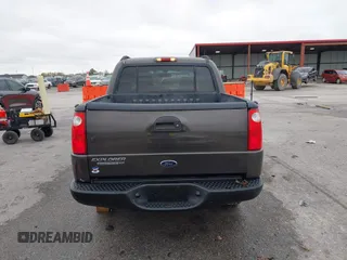 2005 Ford Explorer Sport Trac XLS z VIN 1FMZU77K05UB13891, wystawiony jako IAAI lot #40859877 z przebiegiem 157 308 mil mil oraz . Historia ofert i sprzedaży dostępna na DreamBid. Obrazek 16.