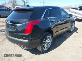2017 Cadillac XT5 Premium Luxury FWD z VIN 1GYKNCRS8HZ127001, wystawiony jako IAAI lot #41698197 z przebiegiem 120 978 mil mil oraz . Historia ofert i sprzedaży dostępna na DreamBid. Obrazek 4.