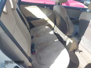 2014 Hyundai Accent GLS with VIN KMHCT4AE4EU590415, listed as a IAAI auction lot 41877817 with 169,285 mi miles. Bid and sale history available at carsss.com. Image 8.