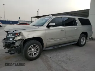 2015 Chevrolet Suburban LT with VIN 1GNSCJKC9FR503955, listed as a Copart auction lot 47382325 with 118,822 mi miles and Salvage Title. Bid and sale history available at carsss.com. Image 1.