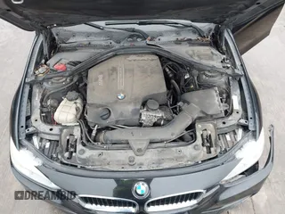 2014 BMW 3 Series 335i with VIN WBA3A9C57EF477662, listed as a IAAI auction lot 41435544 with 129,543 mi miles. Bid and sale history available at carsss.com. Image 10.
