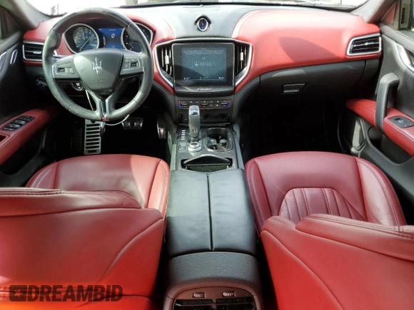 2019 Maserati Ghibli z VIN ZAM57XSA6K1334624, wystawiony jako Copart lot #86902164 z przebiegiem 47 862 mil mil oraz Nie do naprawy • Non repairable. Historia ofert i sprzedaży dostępna na DreamBid. Obrazek 8.