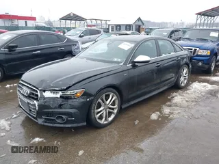 2016 Audi S6 Premium Plus with VIN WAUF2AFC0GN119771, listed as a IAAI auction lot 41541962 with 53,409 mi miles. Bid and sale history available at carsss.com. Image 2.