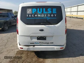 2015 Ford Transit Connect XLT с VIN NM0AE8F79F1205843, выставлен на аукционе Copart как лот 70516794 с пробегом Не указан миль и Списание • Salvage title. История ставок и продаж доступна на DreamBid. Изображение 6.