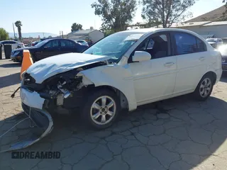 2006 Hyundai Accent GLS with VIN KMHCN46C36U040545, listed as a IAAI auction lot 42021545 with 224,058 mi miles. Bid and sale history available at carsss.com. Image 2.