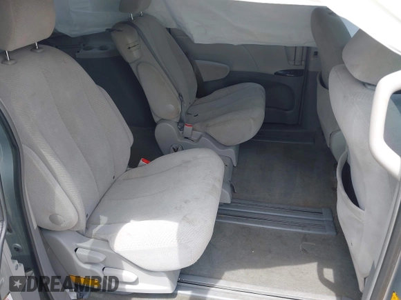2011 Toyota Sienna LE AAS with VIN 5TDKK3DCXBS156328, listed as a IAAI auction lot 42721542 with 153,286 mi miles and . Bid and sale history available at DreamBid. Image 8.