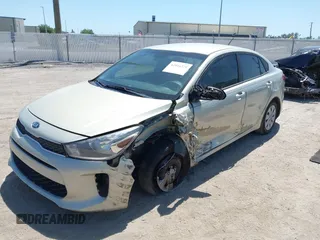 2018 Kia Rio LX with VIN 3KPA24AB2JE137858, listed as a IAAI auction lot 42016321 with 136,728 mi miles. Bid and sale history available at carsss.com. Image 2.