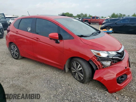 2018 Honda Fit EX-L with VIN 3HGGK5H97JM706911, listed as a Copart auction lot 57121595 with 117,375 mi miles and Salvage title. Bid and sale history available at DreamBid. Image 4.