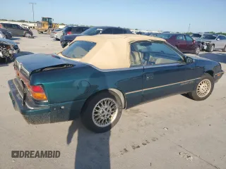 1994 Chrysler LeBaron z VIN 1C3EU4537RF286710, wystawiony jako Copart lot #52610475 z przebiegiem 64 533 mil mil oraz Szkody całkowita. Historia ofert i sprzedaży dostępna na DreamBid. Obrazek 3.