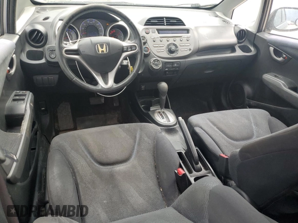 2009 Honda Fit Sport with VIN JHMGE88469S064405, listed as a Copart auction lot 61413745 with 179,497 mi miles and Salvage title. Bid and sale history available at DreamBid. Image 8.
