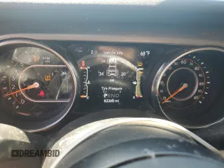 2020 Jeep Wrangler Unlimited Black and Tan with VIN 1C4HJXDGXLW221705, listed as a Copart auction lot 56224785 with 82,360 mi miles and Salvage title. Bid and sale history available at DreamBid. Image 9.