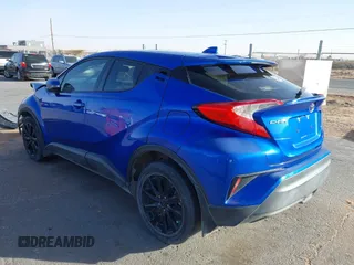 2019 Toyota C-HR XLE with VIN NMTKHMBX3KR098510, listed as a IAAI auction lot 41289899 with 112,981 mi miles. Bid and sale history available at carsss.com. Image 3.