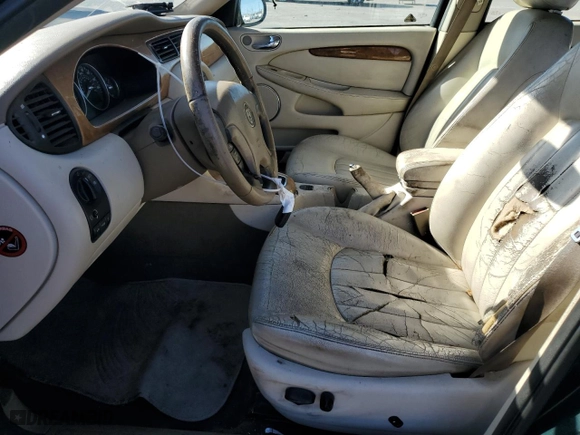 2002 Jaguar X-Type with VIN SAJEA51C12WC33477, listed as a Copart auction lot 83711124 with 165,637 mi miles and Salvage Title. Bid and sale history available at carsss.com. Image 7.