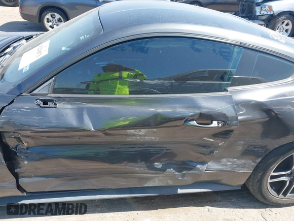 2015 Ford Mustang V6 with VIN 1FA6P8AM8F5329519, listed as a IAAI auction lot 42226971 with 108,730 mi miles and . Bid and sale history available at DreamBid. Image 14.