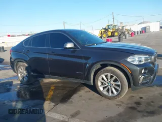 2019 BMW X6 sDrive35i z VIN 5UXKU0C57K0S97581, wystawiony jako IAAI lot #41322568 z przebiegiem 76 635 mil mil oraz . Historia ofert i sprzedaży dostępna na DreamBid. Obrazek 13.