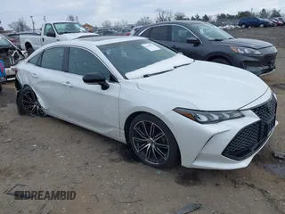 2019 Toyota Avalon XLE with VIN 4T1BZ1FB5KU014903, listed as a IAAI auction lot 41388692 with 100,599 mi miles. Bid and sale history available at carsss.com. Image 1.