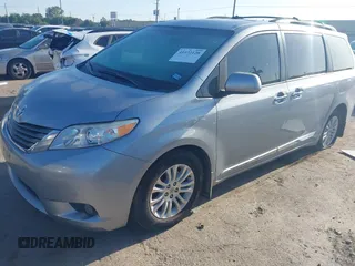 2014 Toyota Sienna XLE with VIN 5TDYK3DC8ES423450, listed as a IAAI auction lot 41972128 with 145,374 mi miles. Bid and sale history available at carsss.com. Image 17.