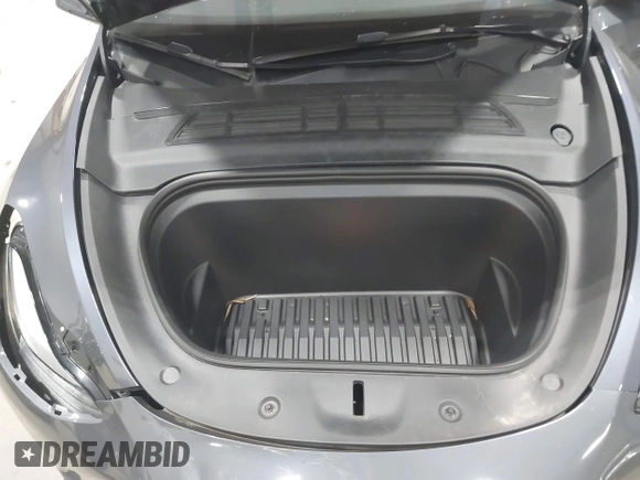 2023 Tesla Model Y Long Range with VIN 7SAYGAEE2PF755674, listed as a IAAI auction lot 41890025 with 24,783 mi miles and . Bid and sale history available at DreamBid. Image 10.