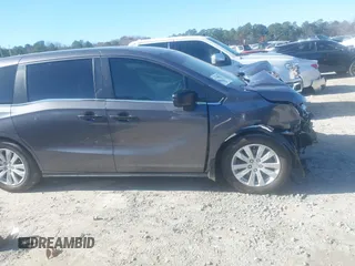 2021 Honda Odyssey LX с VIN 5FNRL6H26MB002074, выставлен на аукционе IAAI как лот 41155572 с пробегом Не указан миль и . История ставок и продаж доступна на DreamBid. Изображение 14.