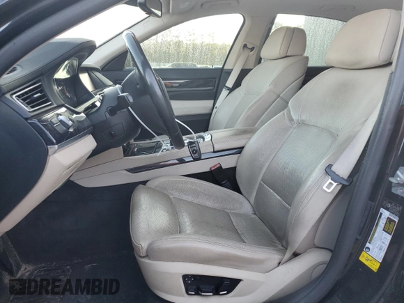 2011 BMW 7 Series 740i with VIN WBAKA4C55BC612987, listed as a Copart auction lot 76607654 with 154,118 mi miles and Salvage Title. Bid and sale history available at carsss.com. Image 7.