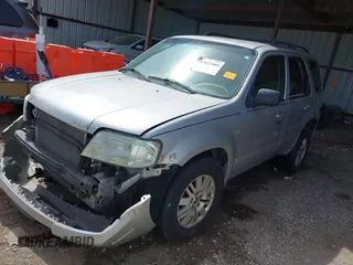 2006 Mercury Mariner Convenience with VIN 4M2YU56Z86KJ12563, listed as a IAAI auction lot 41817401 with 152,156 mi miles and . Bid and sale history available at DreamBid. Image 2.