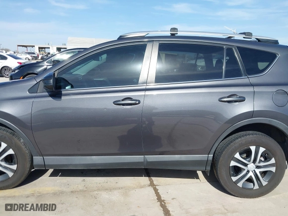 2018 Toyota RAV4 LE with VIN 2T3ZFREV4JW412661, listed as a IAAI auction lot 41781229 with 140,131 mi miles. Bid and sale history available at carsss.com. Image 14.