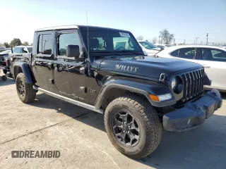 2021 Jeep Gladiator Willys z VIN 1C6HJTAG8ML563161, wystawiony jako Copart lot #52734195 z przebiegiem 48 521 mil mil oraz Szkoda całkowita • Salvage title. Historia ofert i sprzedaży dostępna na DreamBid. Obrazek 4.