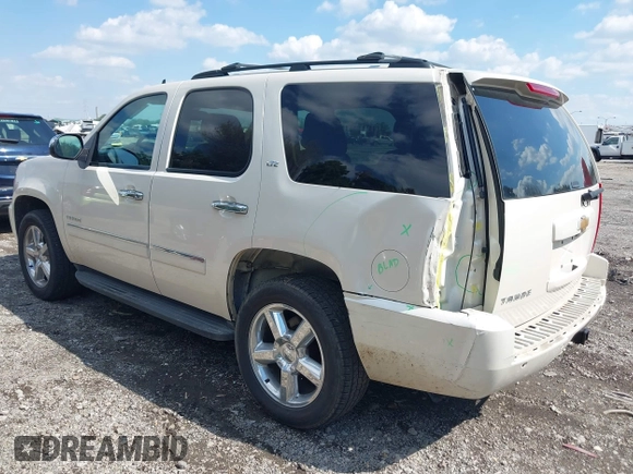 2013 Chevrolet Tahoe LTZ with VIN 1GNSKCE07DR326996, listed as a IAAI auction lot 42203073 with 147,067 mi miles and . Bid and sale history available at DreamBid. Image 3.