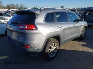 2016 Jeep Cherokee Latitude with VIN 1C4PJMCBXGW118161, listed as a IAAI auction lot 41686583 with 183,431 mi miles. Bid and sale history available at carsss.com. Image 4.