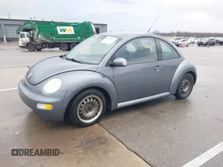2004 Volkswagen New Beetle Coupe GL with VIN 3VWBK21C34M400724, listed as a IAAI auction lot 41658126 with 150,150 mi miles. Bid and sale history available at carsss.com. Image 2.