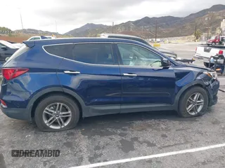 2017 Hyundai Santa Fe 2.4L z VIN 5XYZT3LB1HG489625, wystawiony jako IAAI lot #41784791 z przebiegiem 95 435 mil mil oraz . Historia ofert i sprzedaży dostępna na DreamBid. Obrazek 13.