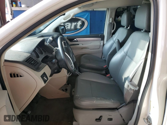 2011 Volkswagen Routan SE with VIN 2V4RW3DG7BR717718, listed as a Copart auction lot 63480915 with 271,938 mi miles and Salvage title. Bid and sale history available at DreamBid. Image 7.