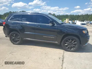 2015 Jeep Grand Cherokee Summit with VIN 1C4RJFJG6FC828922, listed as a Copart auction lot 54878415 with 125,781 mi miles and Salvage title. Bid and sale history available at DreamBid. Image 4.