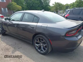 2015 Dodge Charger SXT with VIN 2C3CDXHGXFH897395, listed as a IAAI auction lot 42383907 with 145,334 mi miles and . Bid and sale history available at DreamBid. Image 3.