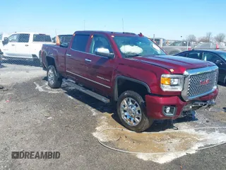 2016 GMC Sierra 2500HD Denali z VIN 1GT12UE87GF287056, wystawiony jako IAAI lot #41753772 z przebiegiem 284 546 mil mil oraz . Historia ofert i sprzedaży dostępna na DreamBid. Obrazek 1.