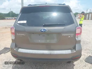 2017 Subaru Forester Touring with VIN JF2SJGWCXHH558789, listed as a IAAI auction lot 42518698 with 112,294 mi miles and . Bid and sale history available at DreamBid. Image 16.