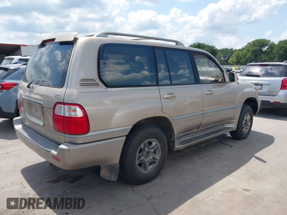 2001 Lexus LX 470 with VIN JTJHT00W713511796, listed as a IAAI auction lot 42222574 with 297,427 mi miles and . Bid and sale history available at carsss.com. Image 4.