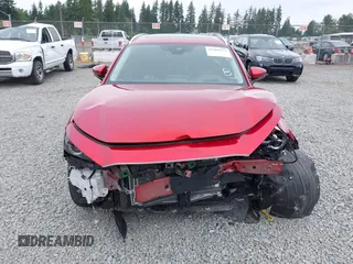 2023 Mazda CX-30 S Premium with VIN 3MVDMBDM1PM520048, listed as a IAAI auction lot 42468172 with 7,277 mi miles and . Bid and sale history available at DreamBid. Image 13.