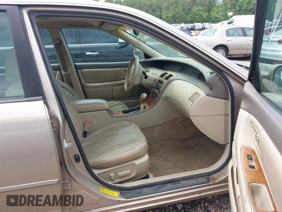 2000 Toyota Avalon XL with VIN 4T1BF28B4YU003928, listed as a IAAI auction lot 42047894 with 303,179 mi miles and . Bid and sale history available at DreamBid. Image 5.