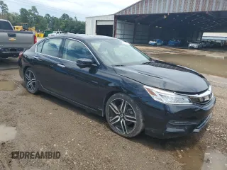 2016 Honda Accord Touring z VIN 1HGCR3F90GA023231, wystawiony jako Copart lot #63953765 z przebiegiem 167 506 mil mil oraz Czysty tytuł • Clean title. Historia ofert i sprzedaży dostępna na DreamBid. Obrazek 4.