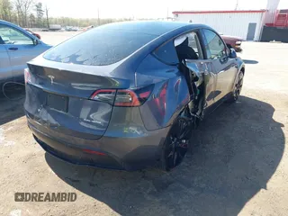 2022 Tesla Model Y Long Range z VIN 7SAYGAEE9NF574634, wystawiony jako IAAI lot #42040719 z przebiegiem 29 675 mil mil oraz . Historia ofert i sprzedaży dostępna na DreamBid. Obrazek 6.