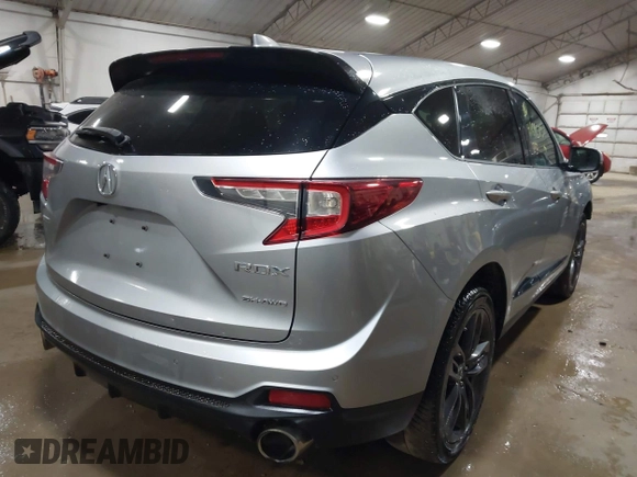 2020 Acura RDX w/A-Spec Pkg with VIN 5J8TC2H63LL022801, listed as a IAAI auction lot 41696731 with 64,093 mi miles. Bid and sale history available at carsss.com. Image 4.