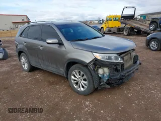2015 Kia Sorento EX with VIN 5XYKUDA77FG627880, listed as a IAAI auction lot 41887489 with 153,565 mi miles and . Bid and sale history available at DreamBid. Image 1.